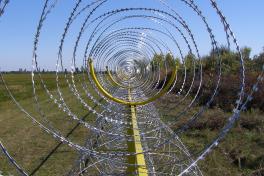 Верхняя спираль забора